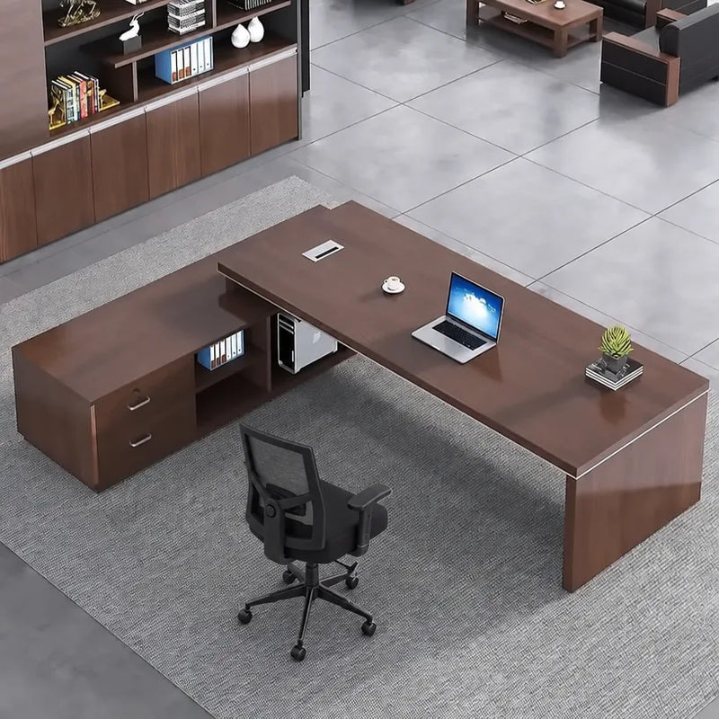Altona desk in walnut viewed from above, laptop open and task chair pulled up