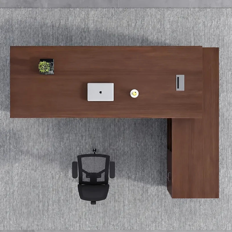 Top-down view of the Altona L-shaped desk in walnut on gray carpet