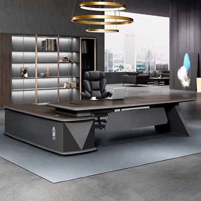Walnut Alwin executive desk with right return in a dramatic dark office with brass ring lights