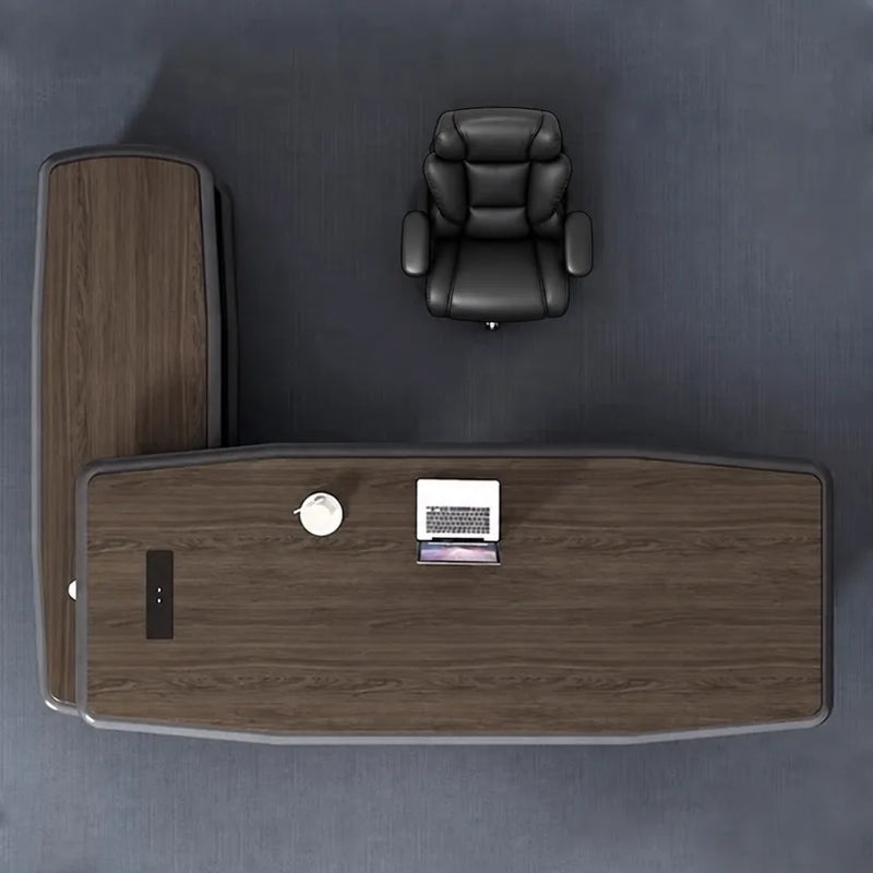 Top-down view of the Alwin desk in walnut showing the desktop port and return chair