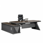 Alwin L-shaped desk in walnut with executive chair, suited to a dealership office
