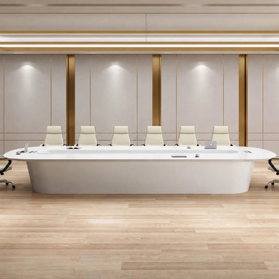 Amica white boardroom table with a row of white chairs in a beige-paneled room with brass trim