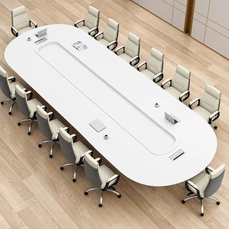 Angled overhead view of the Amica white conference table with 12 chairs and flip-up cable grommets