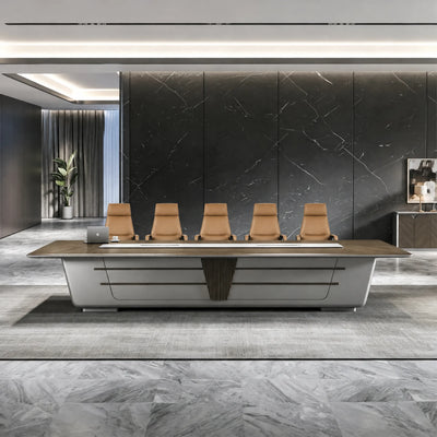 Amiens executive boardroom table with tan leather chairs against a black stone feature wall