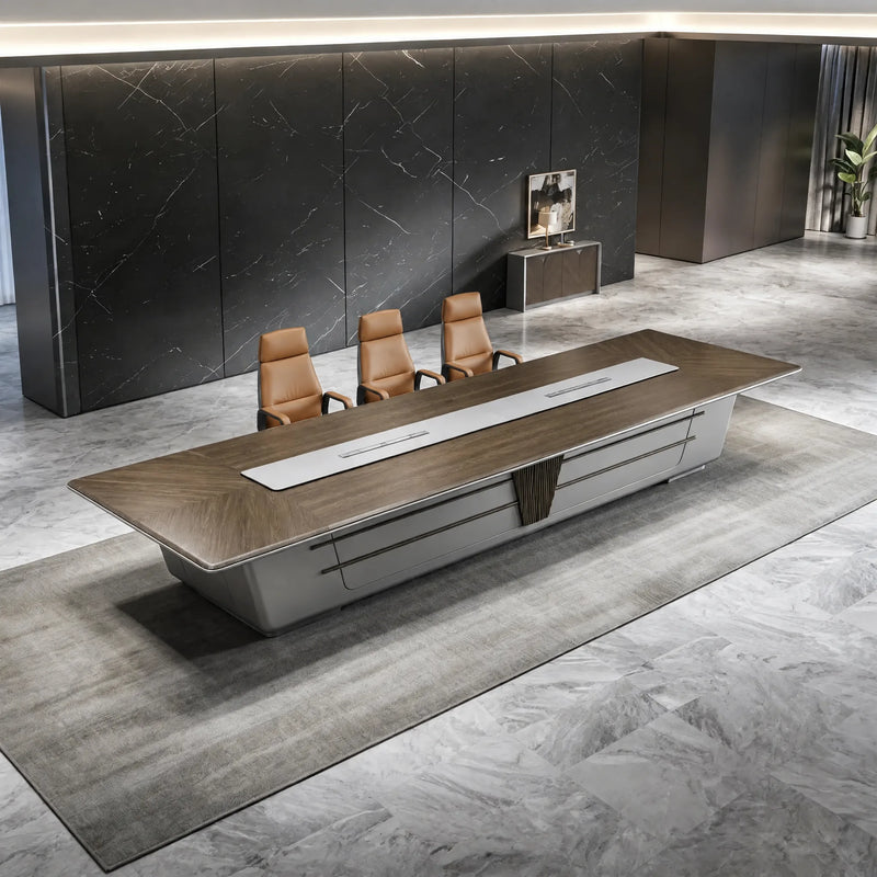 Amiens grand boardroom table in its massive 19′8″ (236-inch) length, seats up to 18, in a black stone-walled room
