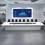 Amix white boardroom table with orange chairs facing a wall-mounted dashboard screen in a futuristic office