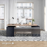 Anderson standing desk at desk height in an elegant white home office with city windows