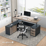 Anderson desk lifted to standing height in a home office, monitor raised for upright work