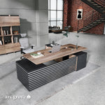 Anderson desk in a two-story loft office, desktop at sitting height with executive chair