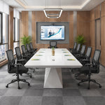 Ardyn white high-gloss boardroom table with black mesh chairs and palms, three-quarter view