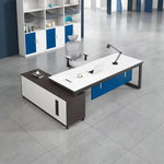 White Astrea manager desk with right return in an office with blue-and-white cabinets