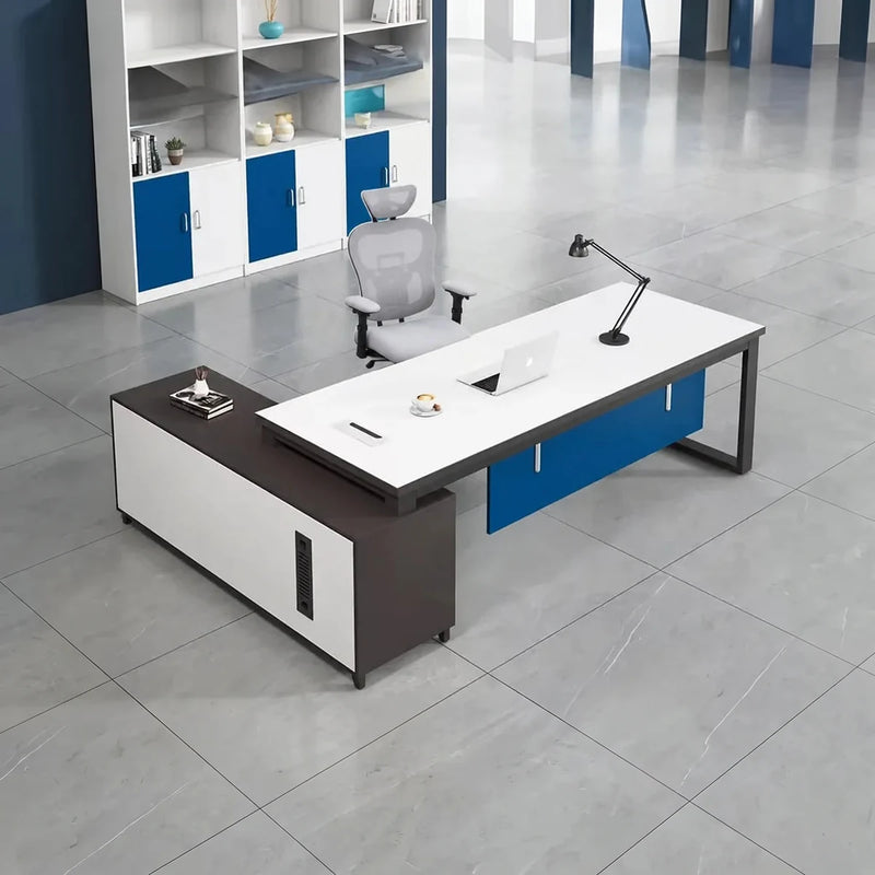 White Astrea manager desk with right return in an office with blue-and-white cabinets