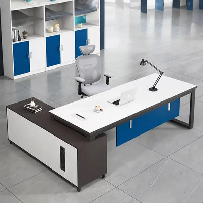 White Astrea manager desk with right return in an office with blue-and-white cabinets