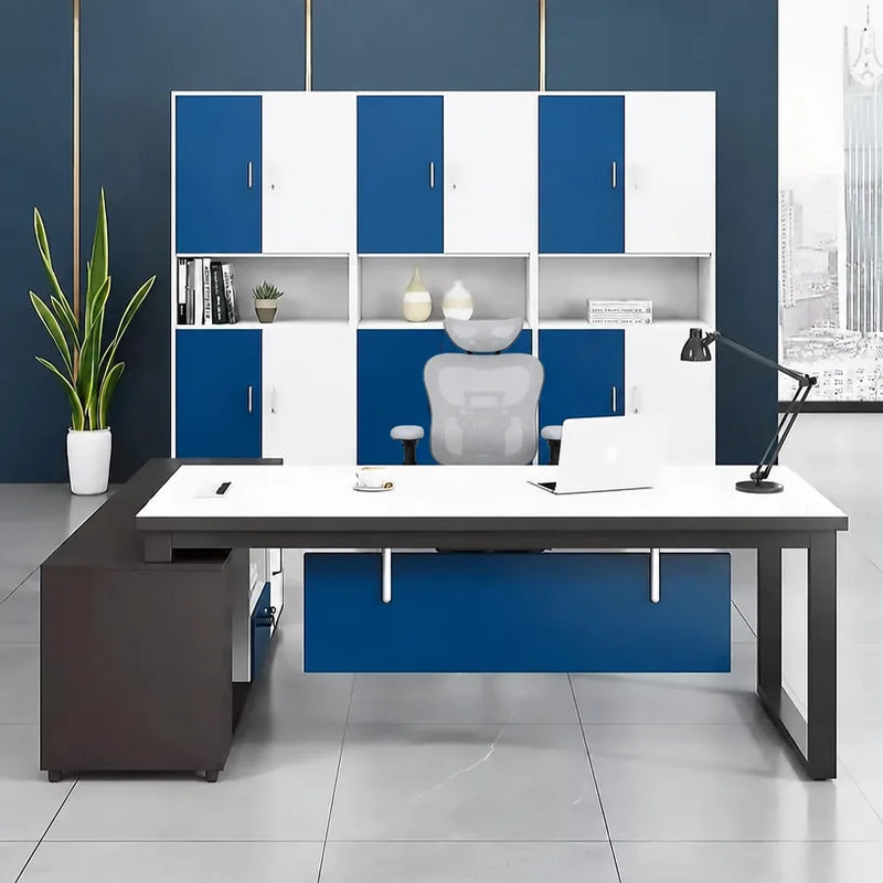 Astrea L-shaped desk in white and blue in a bright office with storage wall
