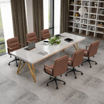 Astrid white collaborative meeting table with tan leather chairs in a library-style office