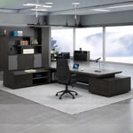 Atlas grand executive desk in Midnight Black in a modern office suite with matching storage wall