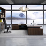 Atlas executive desk in Dark Oak with return cabinet in a waterfront corner office