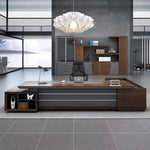 Atlas grand desk in Midnight Black stretching wall to wall in a minimalist gray office