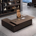 Atlee executive desk with brass-lined base reveal in a marble-floored office