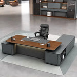 Audley desk in brown oak, right return, with gray upholstered pedestals