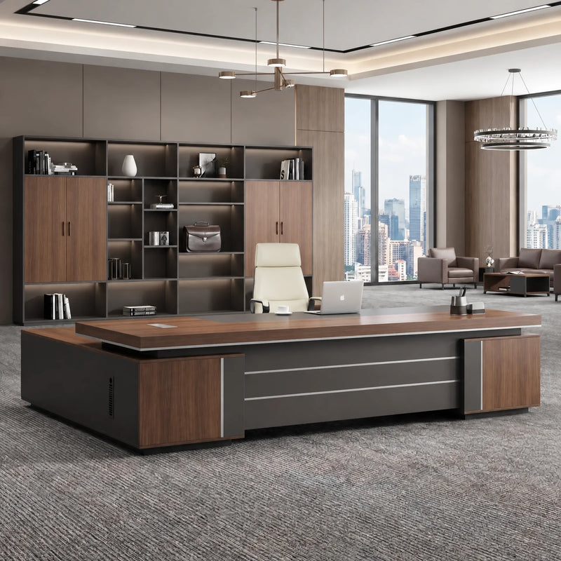 Mahogany August desk with right return facing a wall of curated shelving