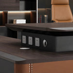 Power and USB outlets under the Bentley desktop edge