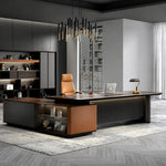 Bramwell desk, right return, in a dark-paneled office with brass pendant lights