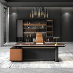 Bramwell executive desk centered in a gray office with backlit shelving