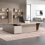 Walnut Brimley desk with right return under high ceilings and city light