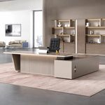 Brimley desk in walnut and cream, left return, beside gallery shelving