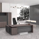 Bristol desk, right return, in a gray-walled office with garden view