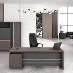 Bristol desk with black leather chair in a marble-floored office