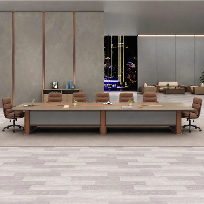 Brock massive 19′8″ (236-inch) boardroom table seating 18, in a gray-paneled room with a city view