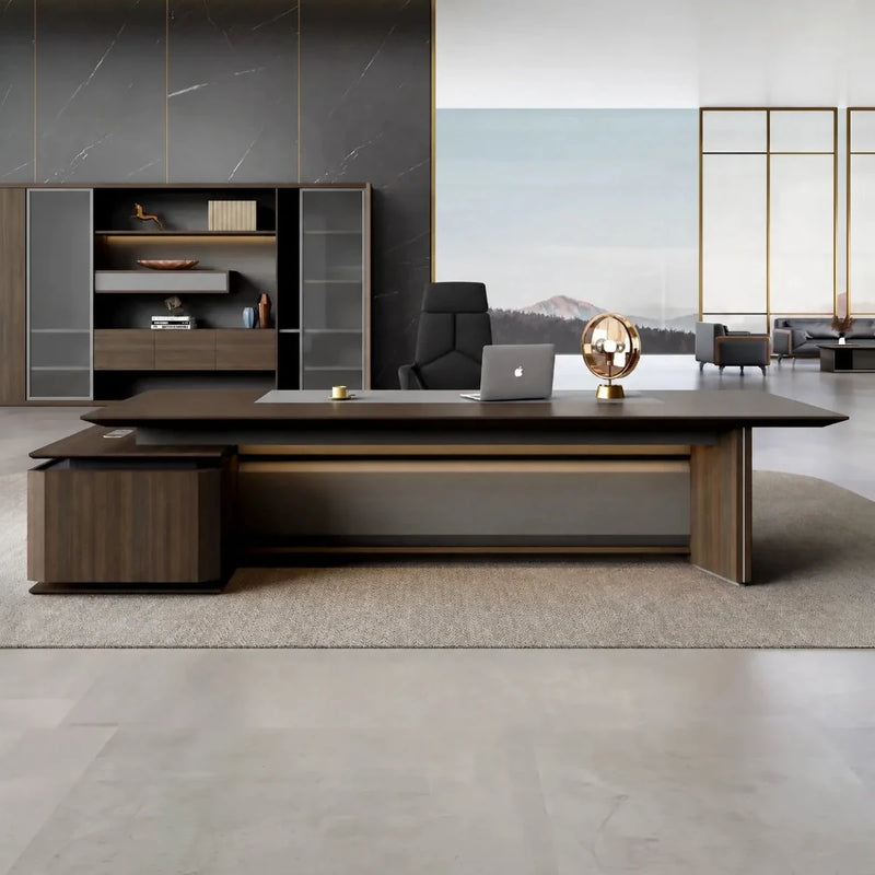 Brontë desk in brown oak in a marble-and-bronze executive office