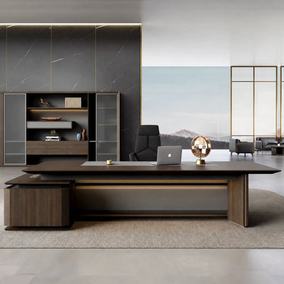 Brontë desk in brown oak in a marble-and-bronze executive office