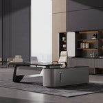 Caldrin executive desk in metal gray, left return, bookshelf wall behind