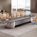 Caliber 15′9″ (189-inch) large conference table seating 14, side view with a laptop and tan chairs
