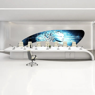 Calix sleek white high-gloss conference table with microphones at each seat in a large presentation hall