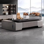Canon grand desk beneath a halo pendant in a mountain-view office