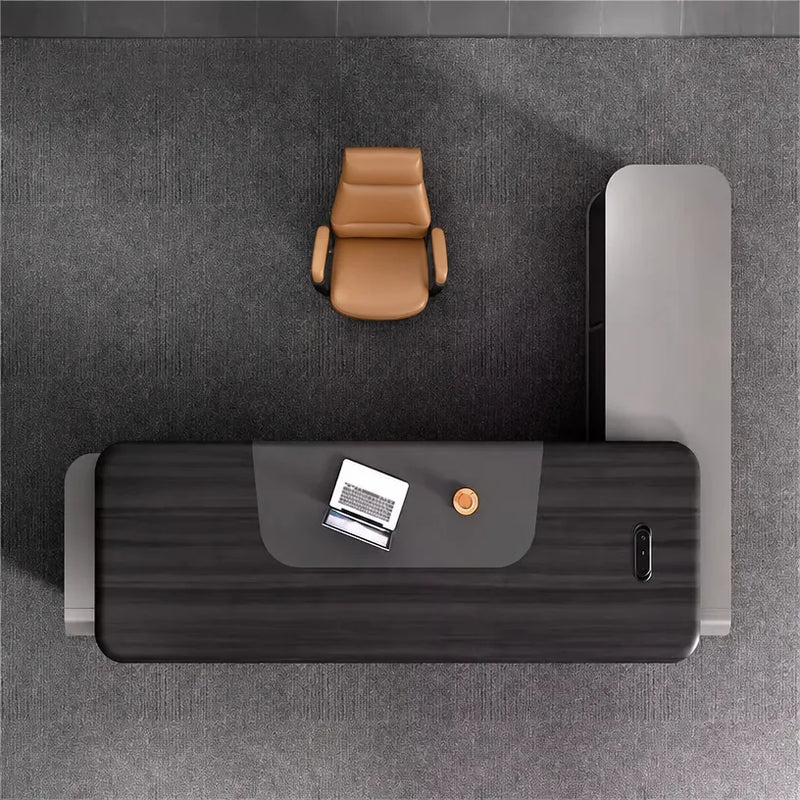 Top-down layout of the Canon L-shaped desk with laptop on the return
