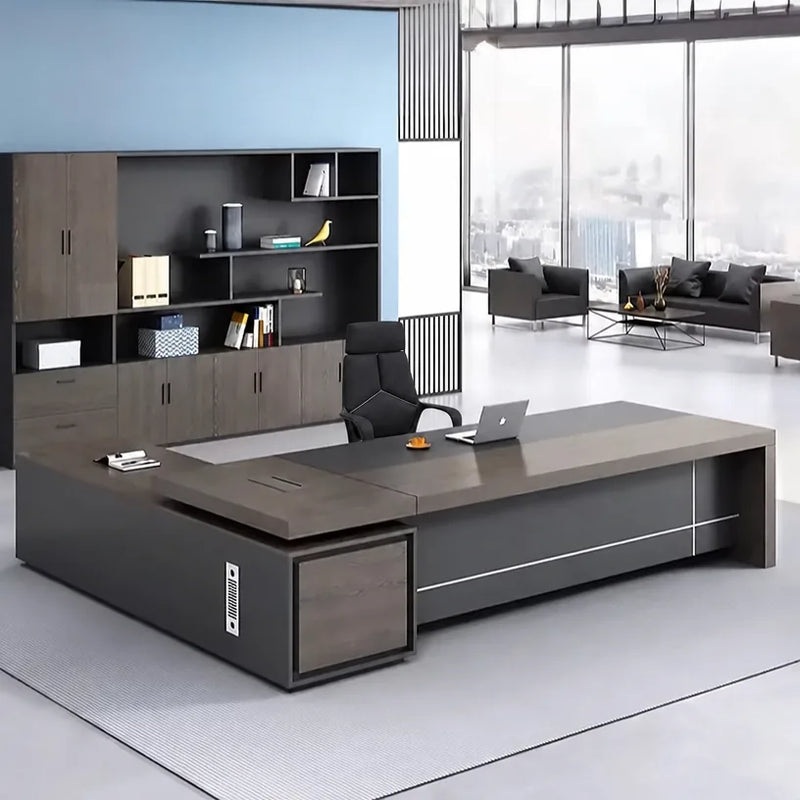 Carlaw desk in gray oak in a blue-walled CEO office with storage wall
