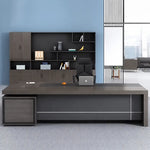 Carlaw executive desk front-on with silver trim and drawer pedestal