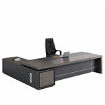 Carlaw desk with high-back chair in a corner office with shelf wall