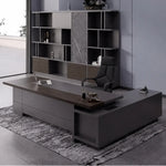 Carwin desk, left return, in a CEO office with display shelving