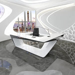 Chevron desk in white with black underside in an organic white suite