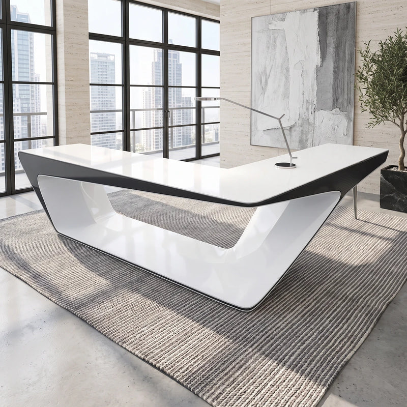 Chevron desk in a sunlit office with a city view