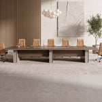 Chymé dark oak conference room table with tan leather chairs beside a window with mountain views