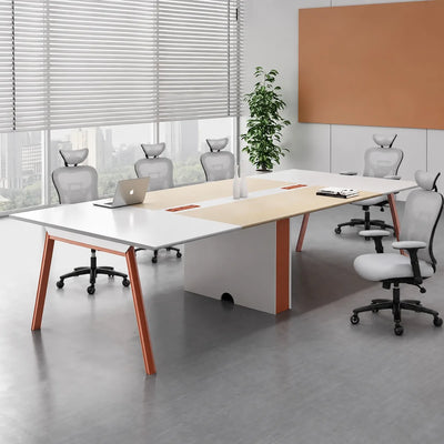 Comity white meeting table with a beige center inlay, laptop and orange chairs, angled view