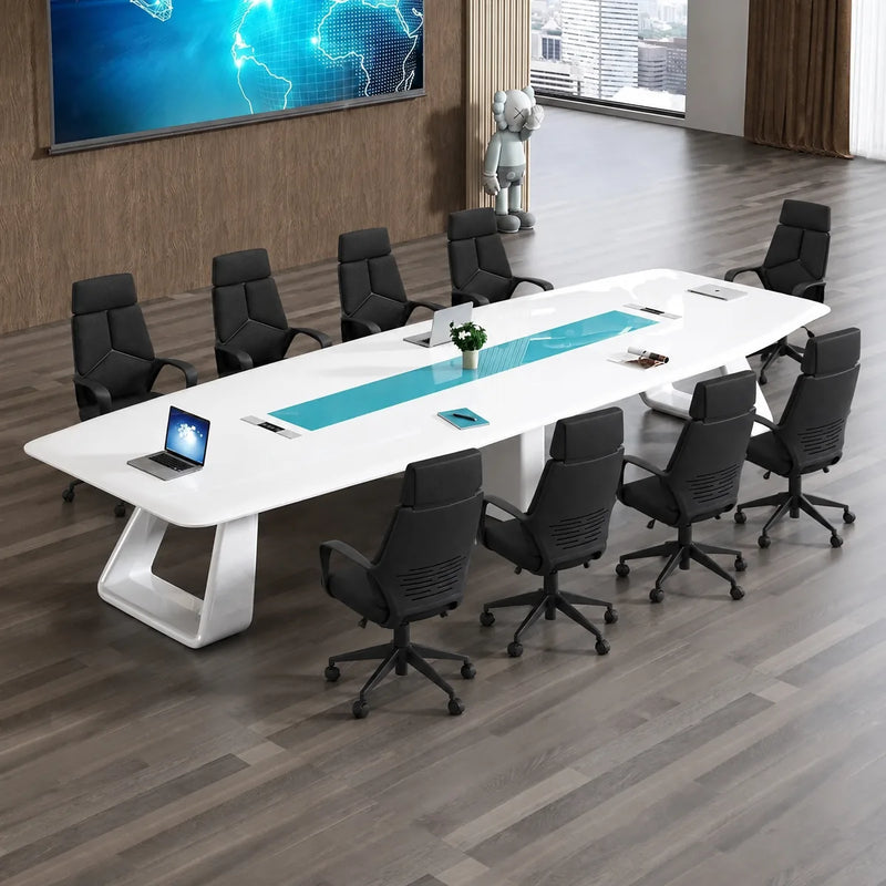 Concord white high-gloss conference table with white and orange chairs, angled view with a laptop