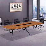 Convo cedar meeting room table with black leather chairs in a gray office with a city skyline window
